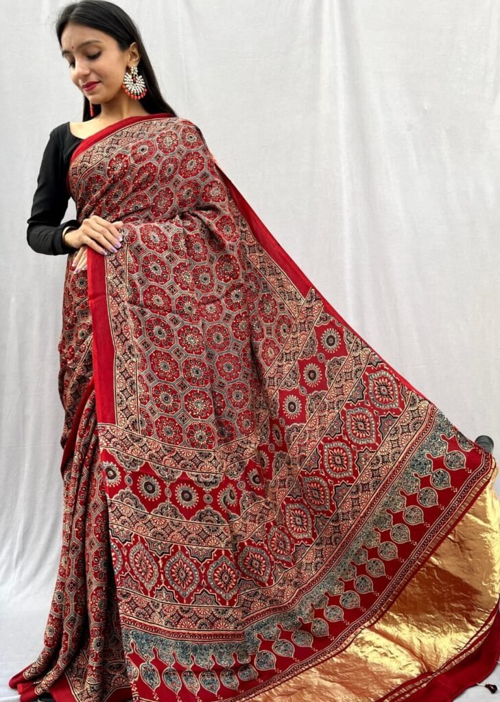 Base colour red with big floral motifs and golden border Price- Rs 8550